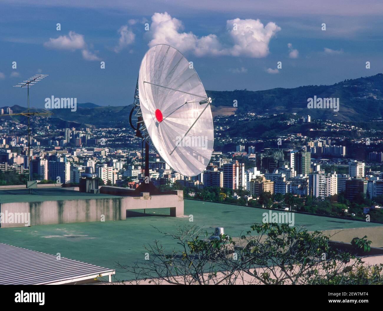 CARACAS, VENEZUELA - Roof top satellite dish for television reception. Stock Photo