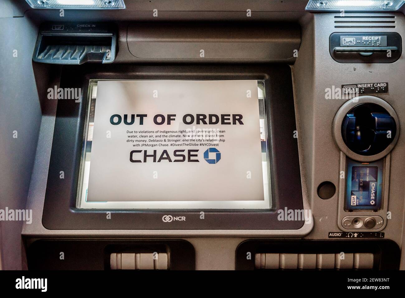 https www alamy com indigenous advocates launched an art intervention by placing out of order signs on atms at various locations of jp morgan chase in manhattan ny on october 24 2017 calling on new york city mayor bill de blasio and comptroller scott stringer to use their positions on the nyc banking commission to end the citys relationship with jpmorgan chase and other banks funding pipelines like the dakota access pipeline dapl photo by erik mcgregor image411383444 html