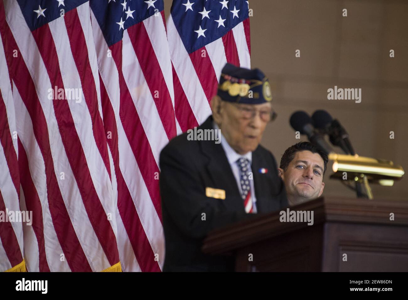 UNITED STATES - OCTOBER 25: Celestino Almeda, a veteran representing the Philippine Commonwealth Army, speaks during a Congressional Gold Medal ceremony in Emancipation Hall to honor Filipino veterans of World War II as Speaker Paul Ryan, R-Wis., looks on, on October 25, 2017. (Photo By Tom Williams/CQ Roll Call) Stock Photo