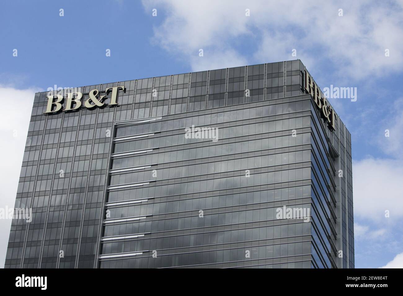 A logo sign outside of a facility occupied by the BB&T Corporation in ...