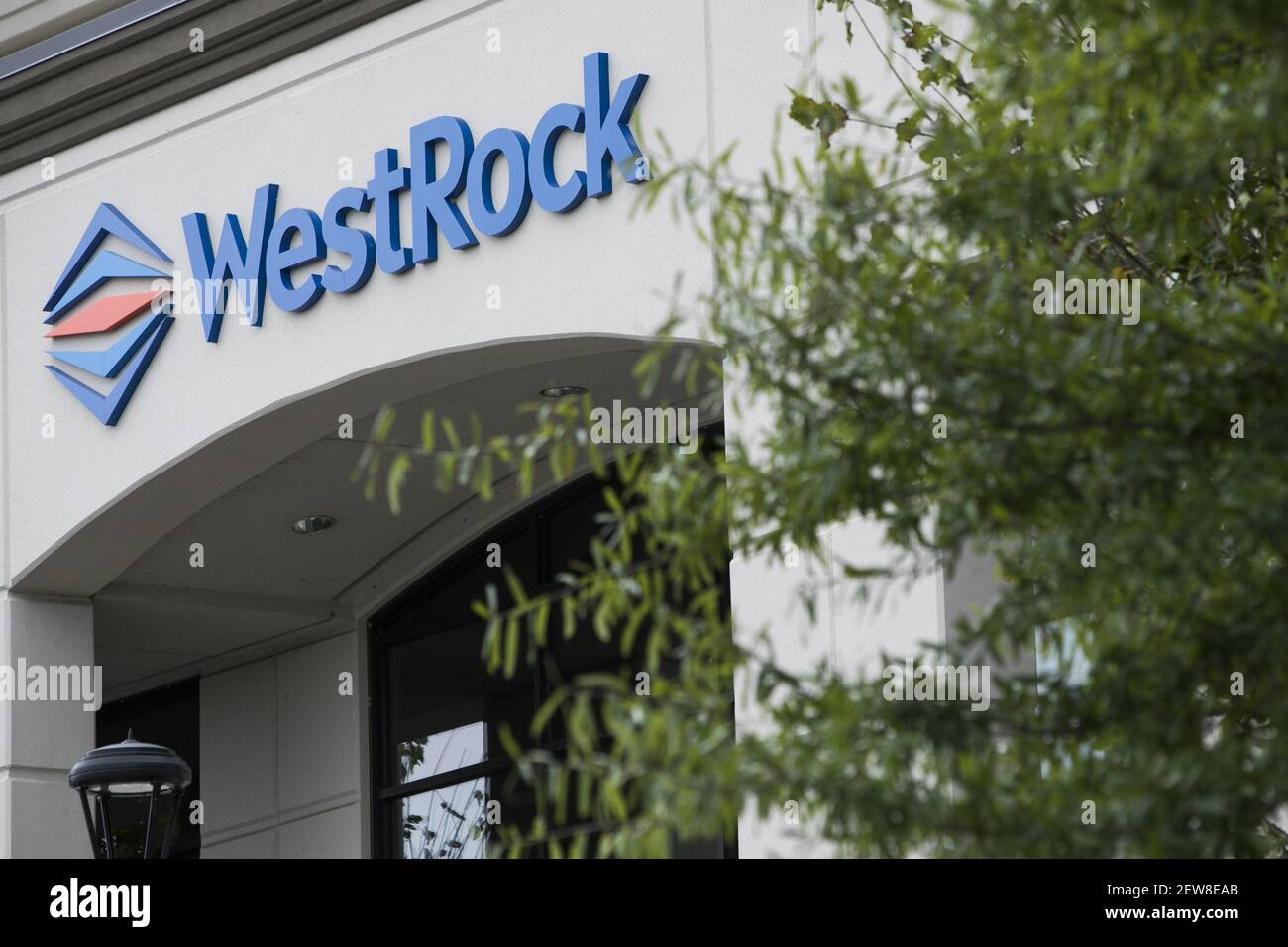 A logo sign outside of a facility occupied by WestRock in Lithia