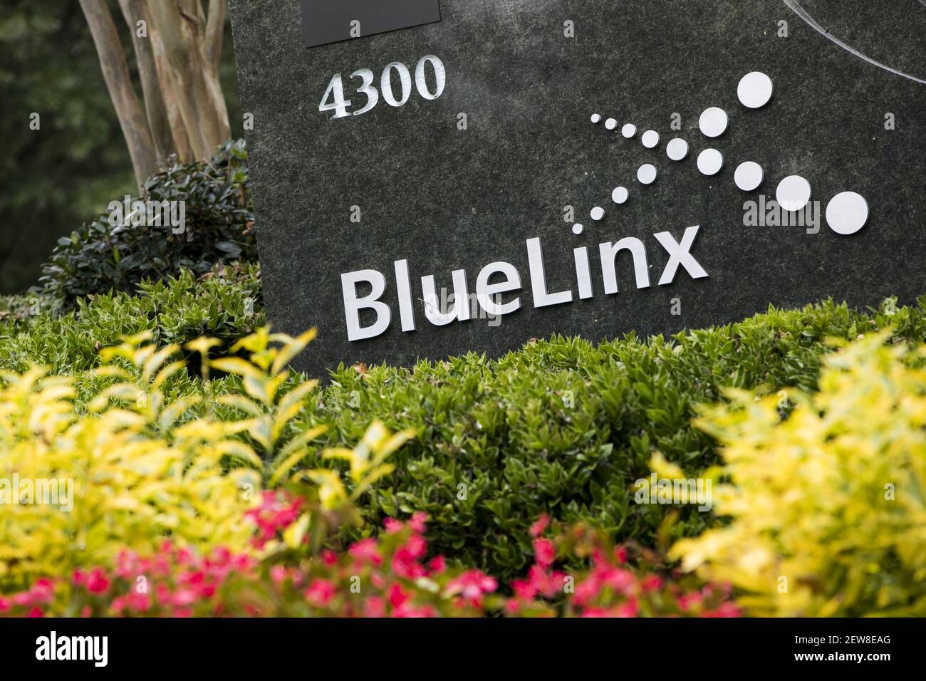 A logo sign outside of the headquarters of BlueLinx Holdings in Atlanta
