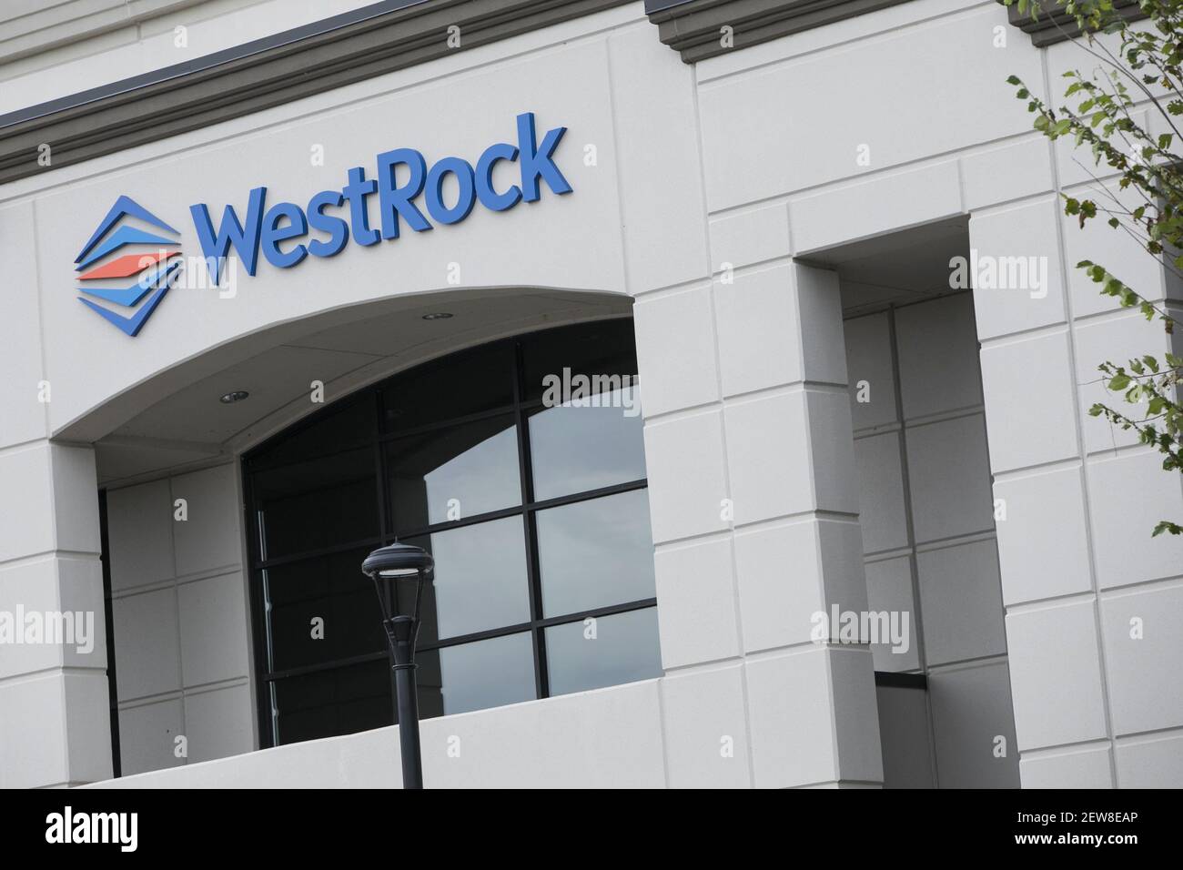 A logo sign outside of a facility occupied by WestRock in Lithia