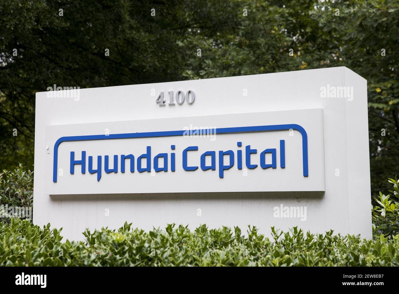 A logo sign outside of a facility occupied by Hyundai Capital America ...