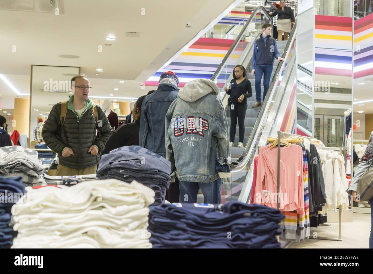 Customers shop in the brand new Gap