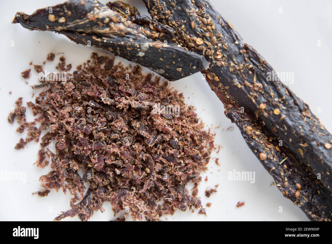 Venison from a wild fallow deer that has been air dried to make homemade biltong. It has been grated to make a topping for scrambled eggs. It was cure Stock Photo