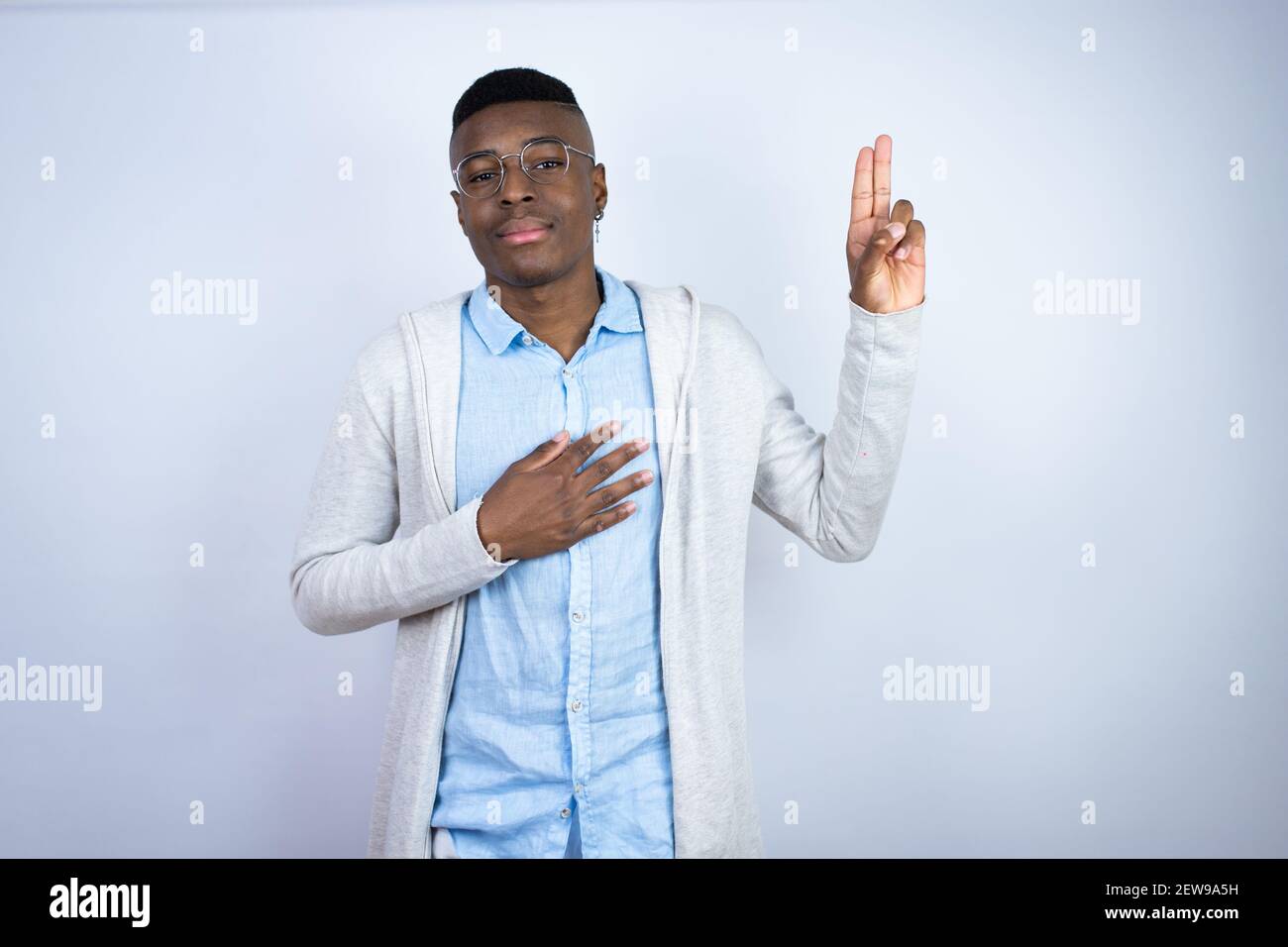 Young handsome african american man wearing casual clothes smiling ...