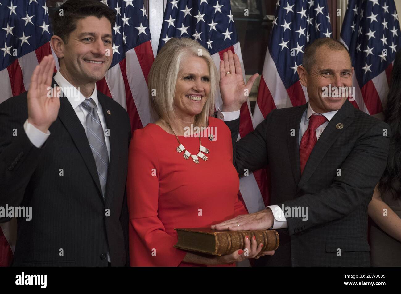 UNITED STATES - NOVEMBER 13: Rep. John Curtis, R-Utah, right, and his wife, Sue, participate in a swearing-in ceremony in the Capitol with Speaker Paul Ryan, R-Wis., before the actual event on the House floor on November 13, 2017. (Photo By Tom Williams/CQ Roll Call) Stock Photo
