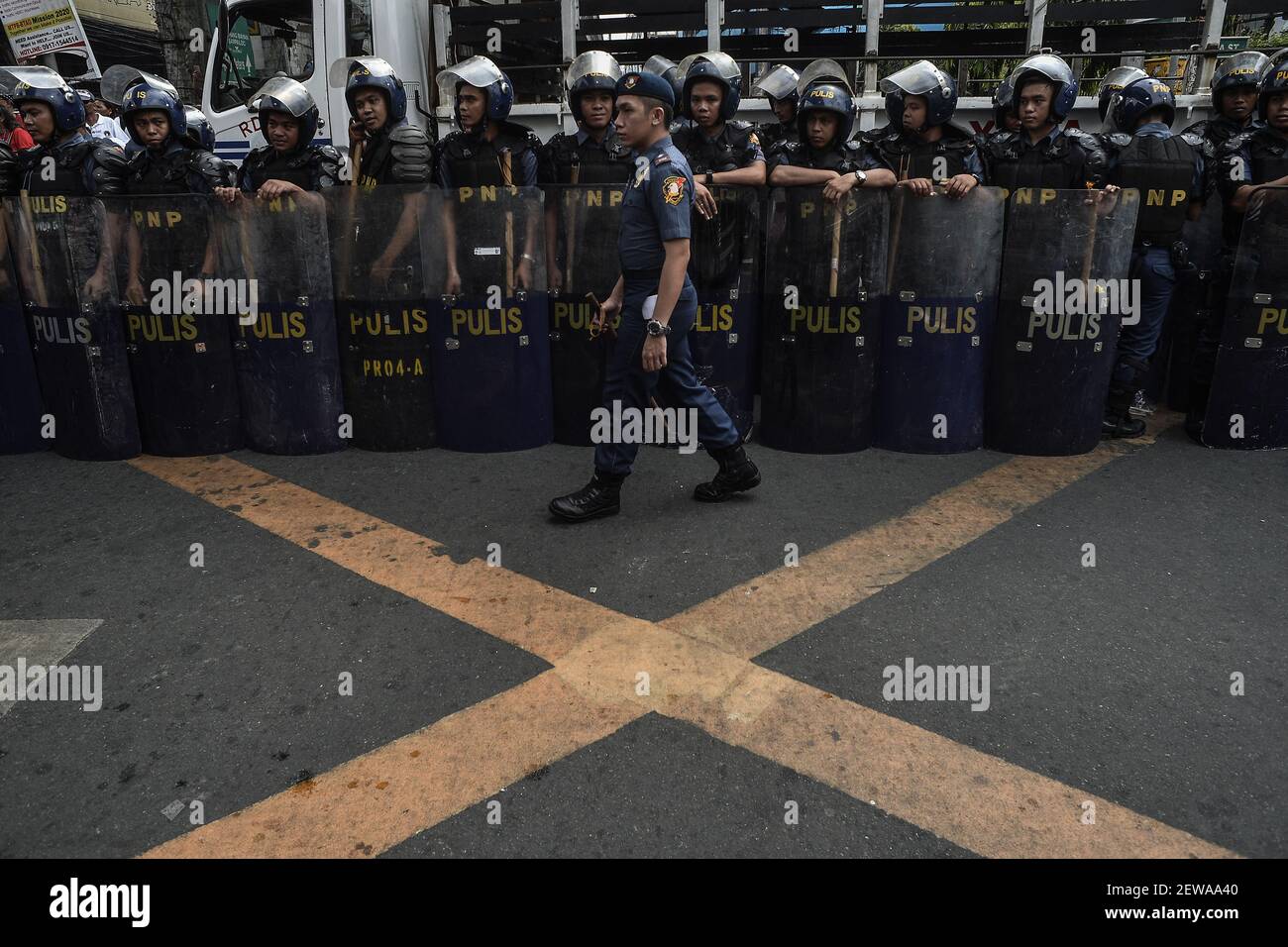 Duerte Protest Riot Riot police hold formation as protesters hold a demonstration against ...