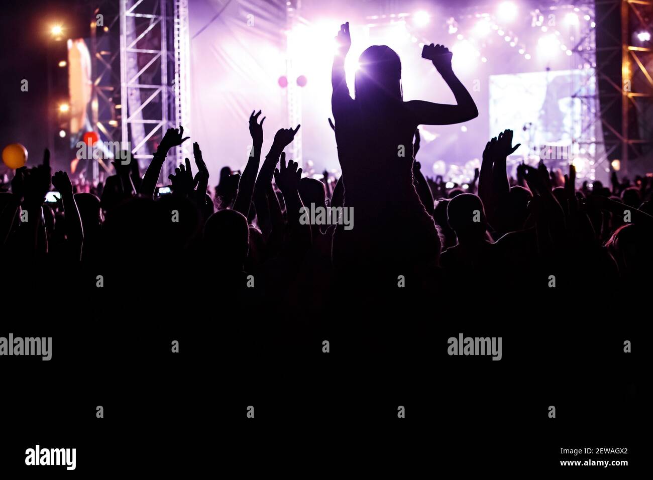 A lot of people at the mass event. Concert crowd Stock Photo - Alamy