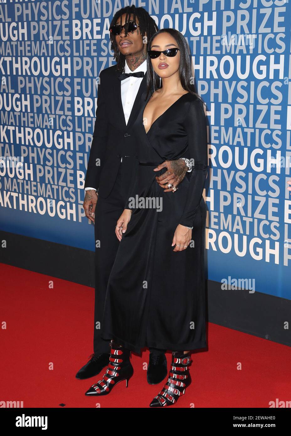 MOUNTAIN VIEW, CA - DECEMBER 3: Wiz Kalifa and Izabela Guedes at the 6th  Annual Breakthrough Prize at NASA Ames Research Center on December 3, 2017  in Mountain View, California. (Photo by