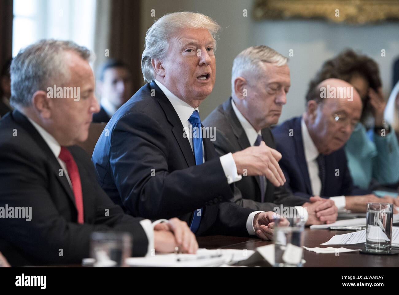 President Donald Trump speaks to the press during a Cabinet meeting at ...