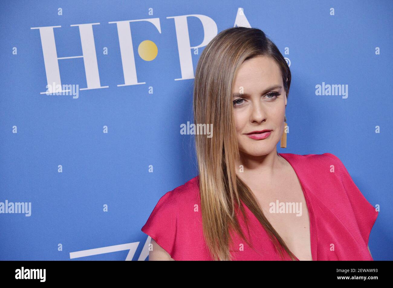 Alicia Silverstone arrives at the HFPA 75th Anniversary Celebration