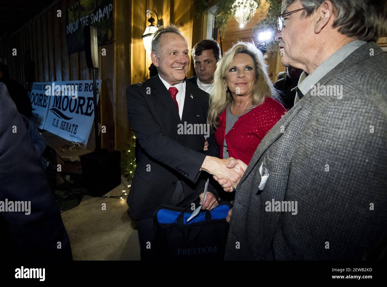 UNITED STATES - DECEMBER 11: Republican Senate candidate Roy Moore, left, and his wife Kayla leave Moore's 'Drain the Swamp' rally in Midland City, Ala., on Monday, Dec. 11, 2017. (Photo By Bill Clark/CQ Roll Call) Stock Photo