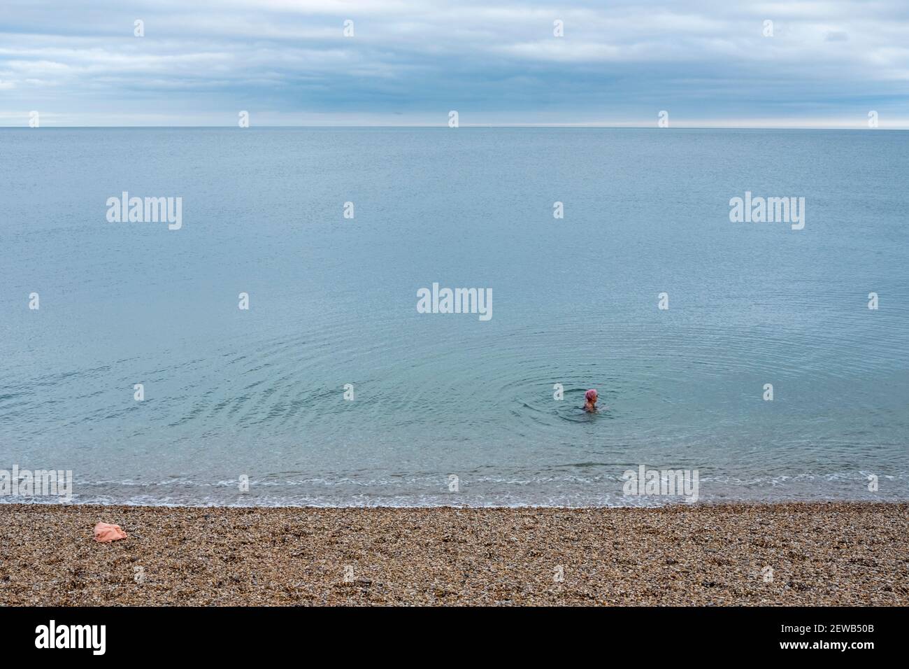 Woman swimming sea waves hi-res stock photography and images - Alamy
