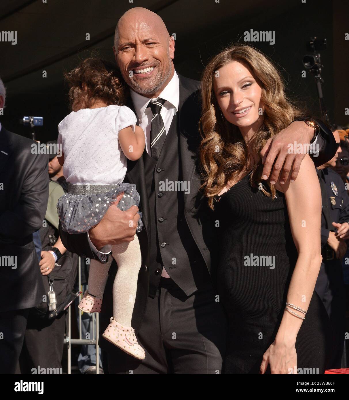 (L-R) Daughter Jasmine Johnson, Dwayne Johnson and Wife Lauren Hashian ...