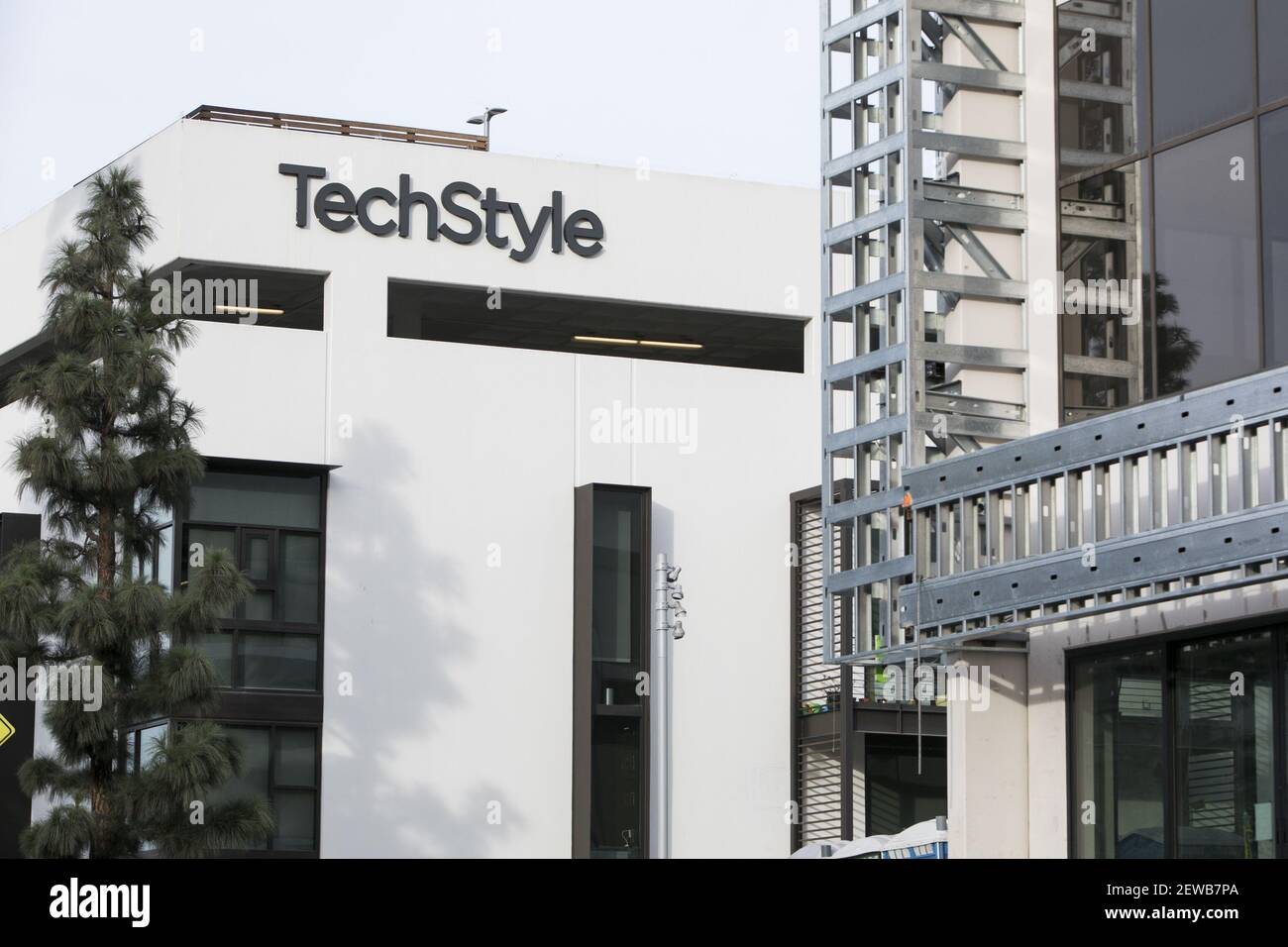 A logo sign outside of the headquarters of the TechStyle Fashion Group