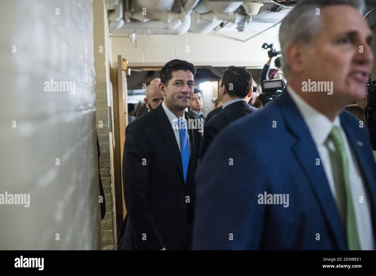 UNITED STATES - DECEMBER 19: Speaker Paul Ryan, R-Wis., left, and House Majority Leader Kevin McCarthy, R-Calif., are seen outside a meeting of the House Republican Conference in the Capitol on December 19, 2017. (Photo By Tom Williams/CQ Roll Call) Stock Photo