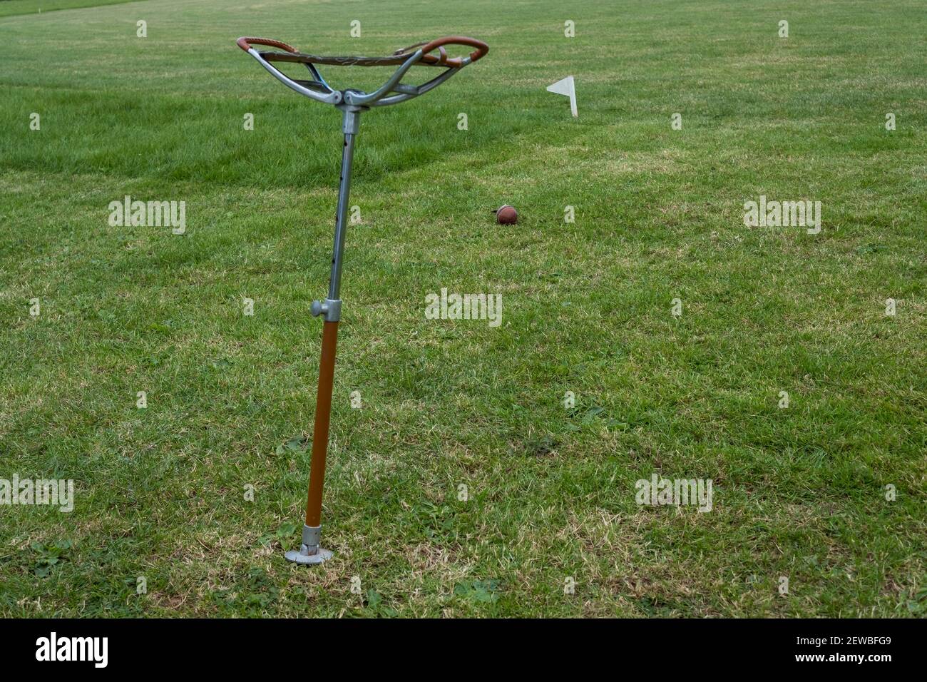 Village cricket match, East Prawle, Devon, umpires shooting stick seat Stock Photo