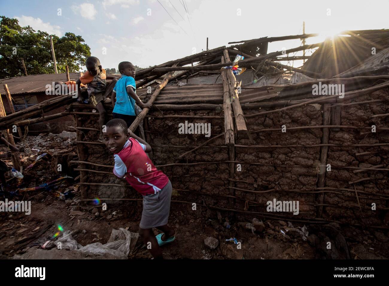 Nairobi, Kenya. 01st Mar, 2021. Kids play on the roofs of an abandoned