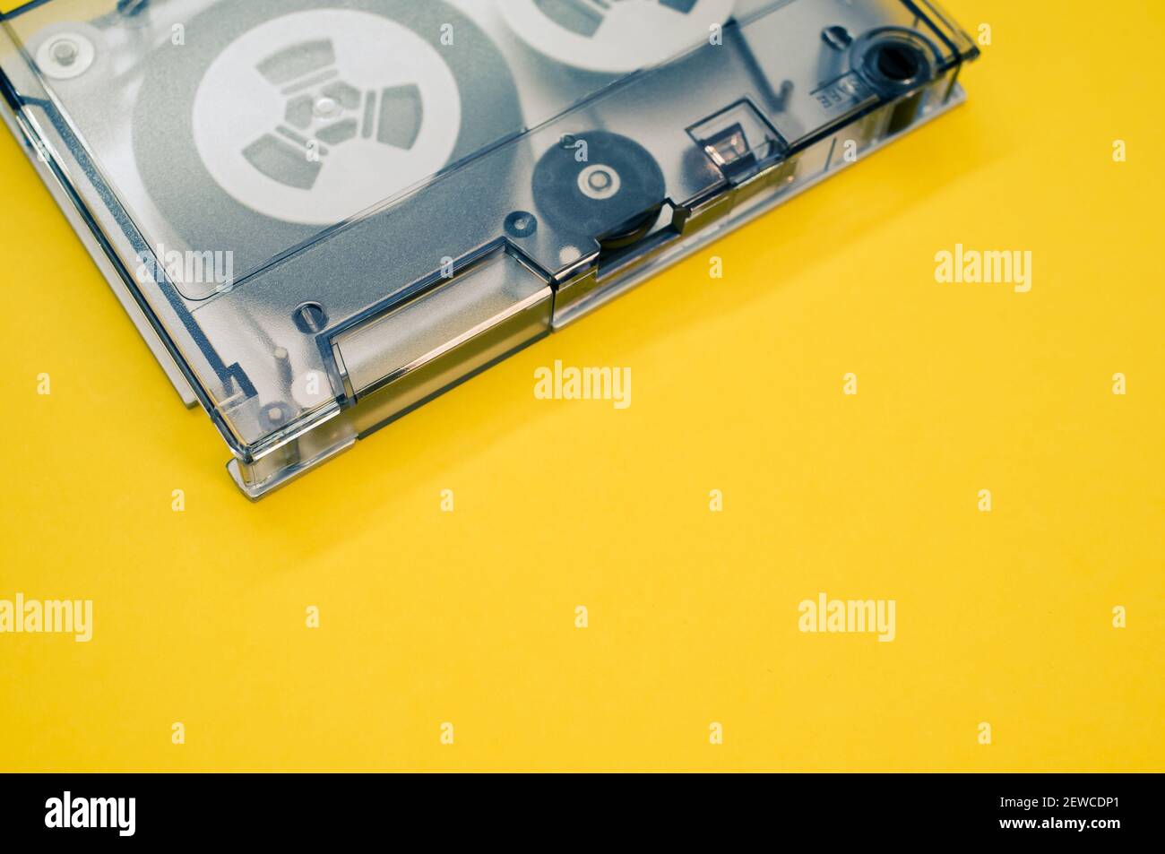 A magnetic tape for data storage isolated in the yellow background with a copy space Stock Photo