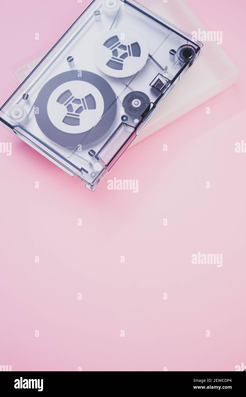A data storage magnetic tape isolated in the pink background with a copy space Stock Photo