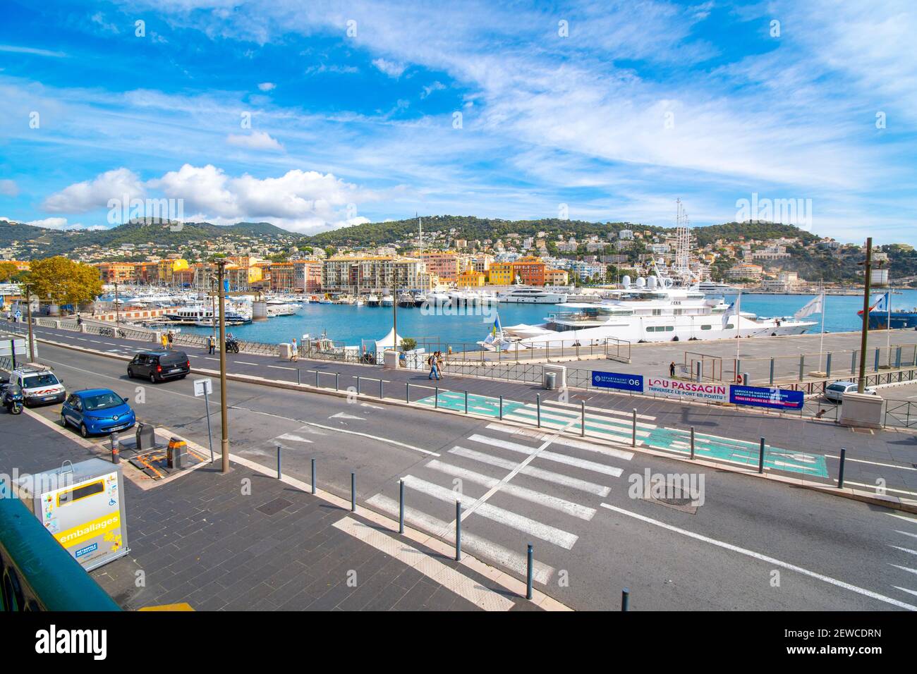 An assortment of boats and watercraft in the old harbor of Port Lympia in the city of Nice France, on the Mediterranean Sea at the French Riviera. Stock Photo