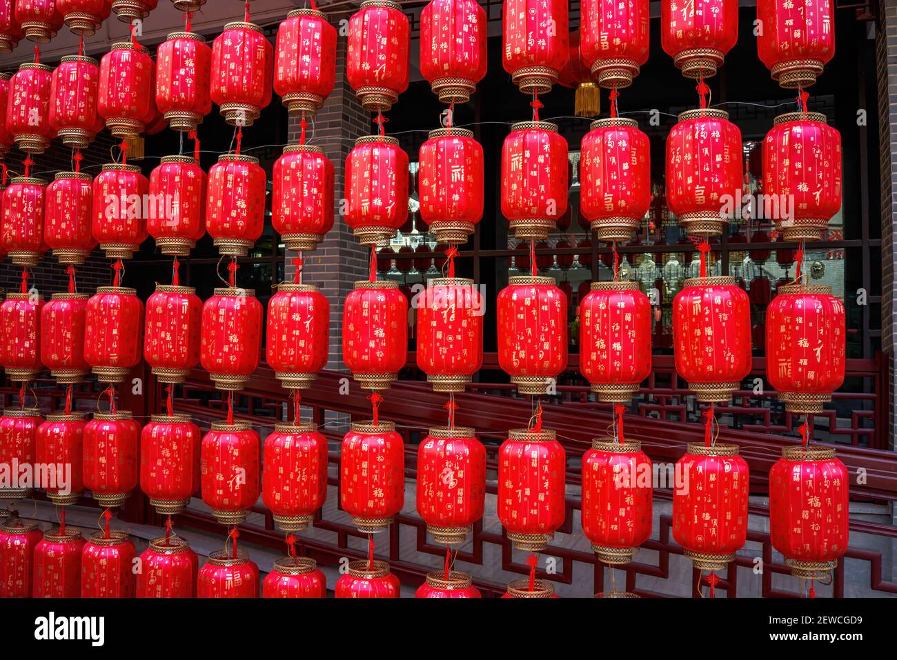Traditional red lantern wall in Chinese Lantern Festival. Translation
