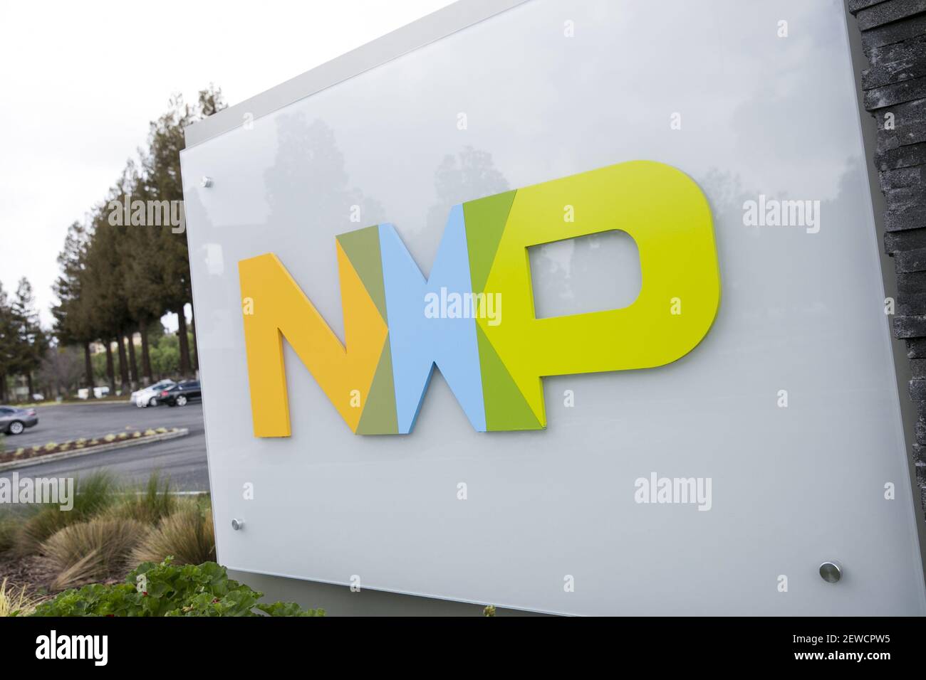 A logo sign outside of a facility occupied by NXP Semiconductors in San ...