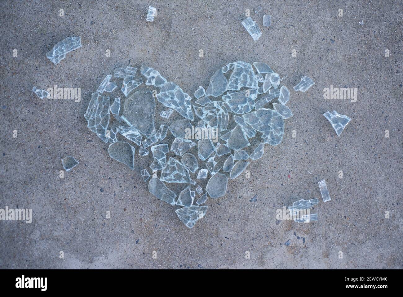 Broken love. Bad relationships. Heart made from glass. Heart-shape. Heart logo. Broken ice heart. Stock Photo