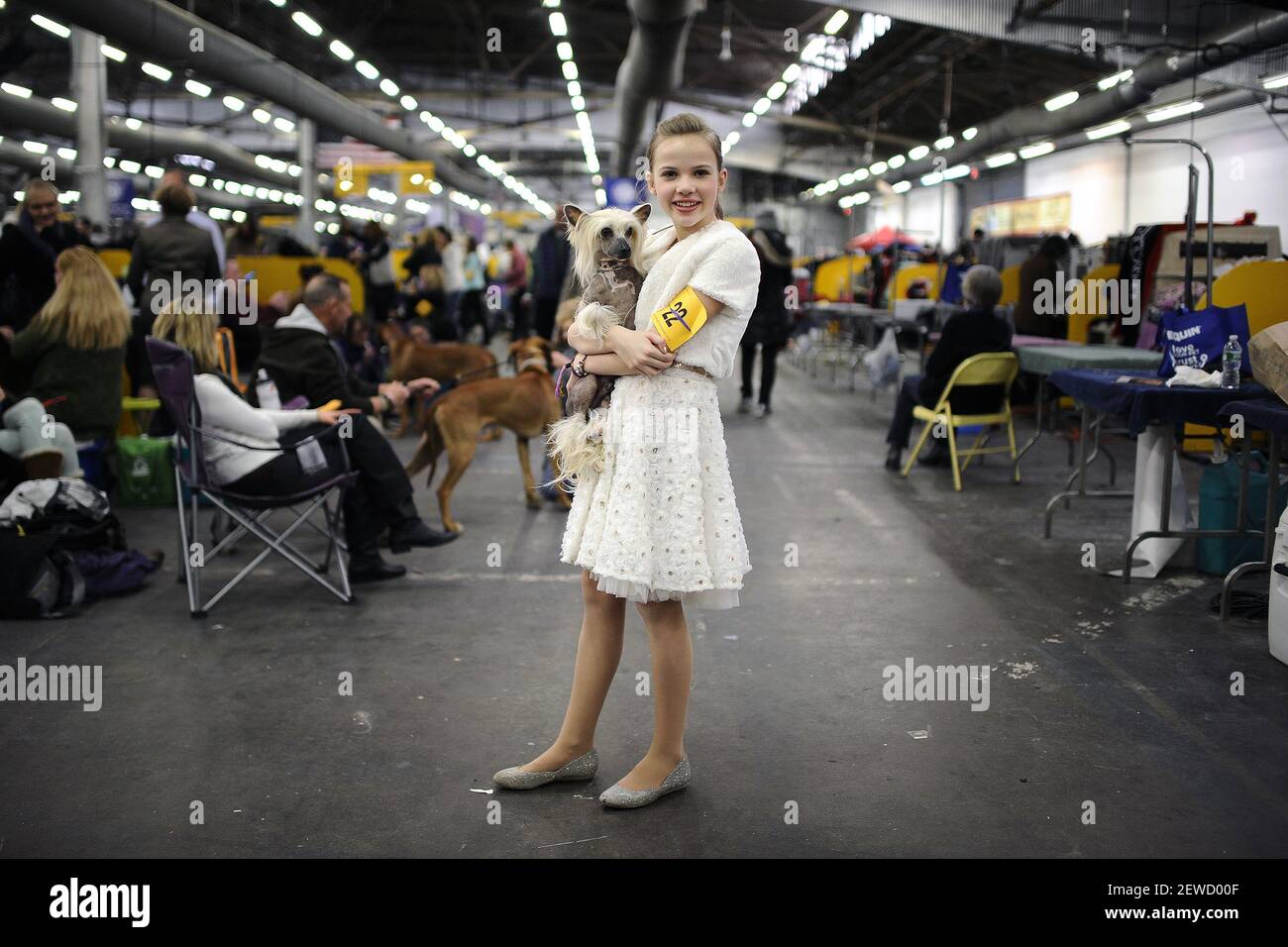 Karen Laplante, 11, from Wisconsin, holds her Chinese Crested named Neo