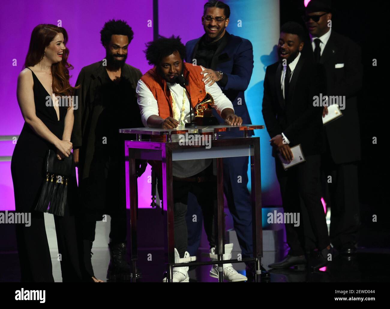 Feb 15, 2016; Los Angeles, CA, USA; Bilal, Kendrick Lamar, Thundercat & Anna  Wise accepts for These Walls in Best Rap/Sung Collaboration during the 58th  Grammy Awards at the Staples Center. Mandatory