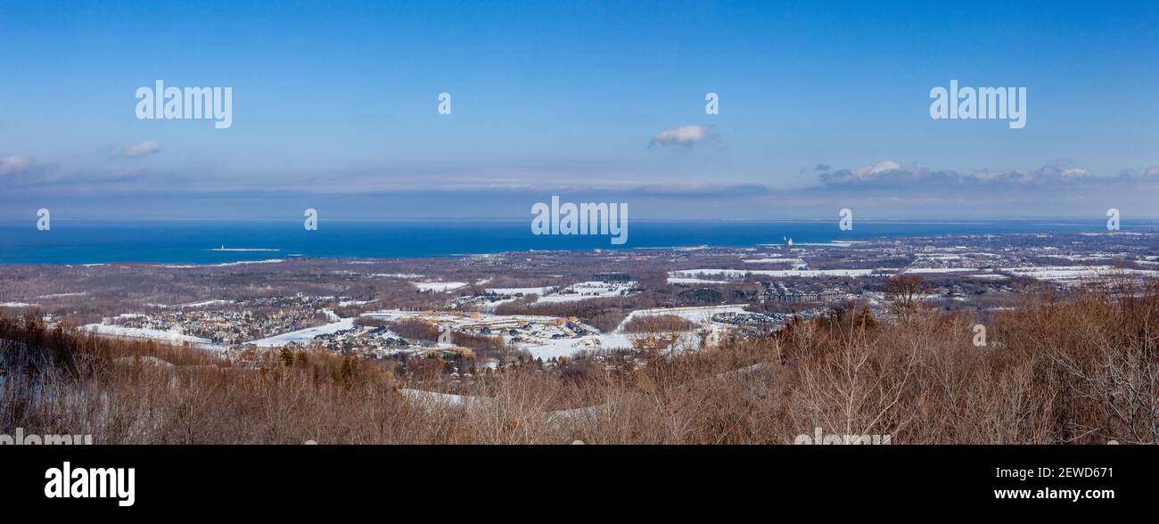 A beautiful winter panorama of Collingwood and the Town of the Blue Mountains from a viewpoint on Scenic Caves Road, above the Blue Mountain Ski Resor Stock Photo