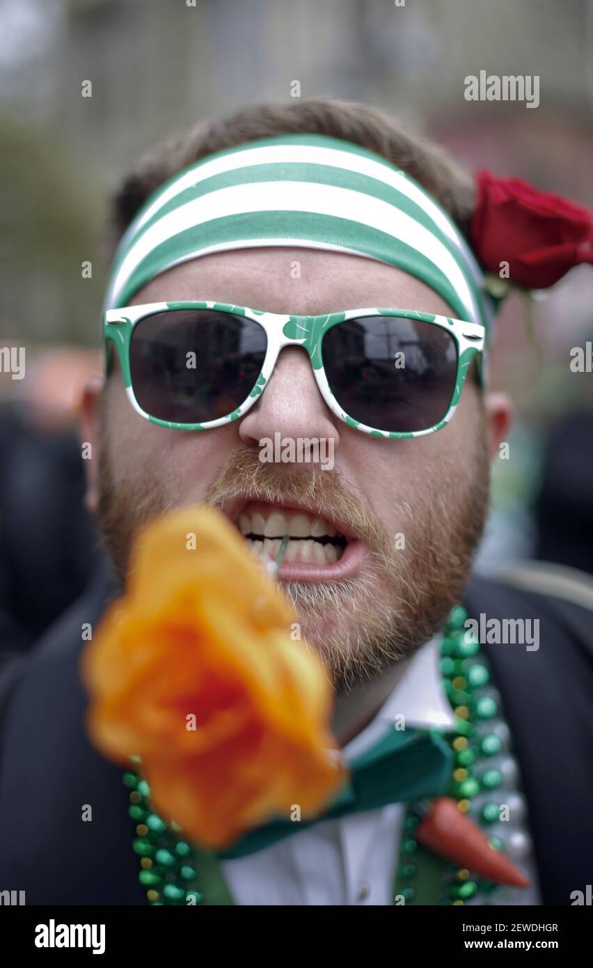 The Irish Channel St Patrick's Day parade makes its way along Magazine