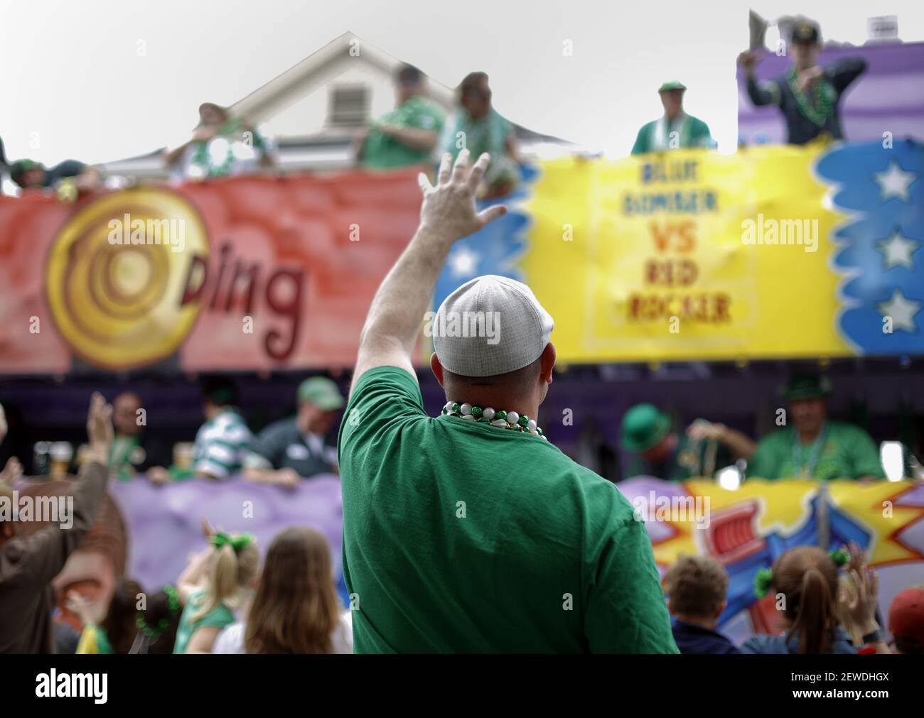 The Irish Channel St Patrick's Day parade makes its way along Magazine