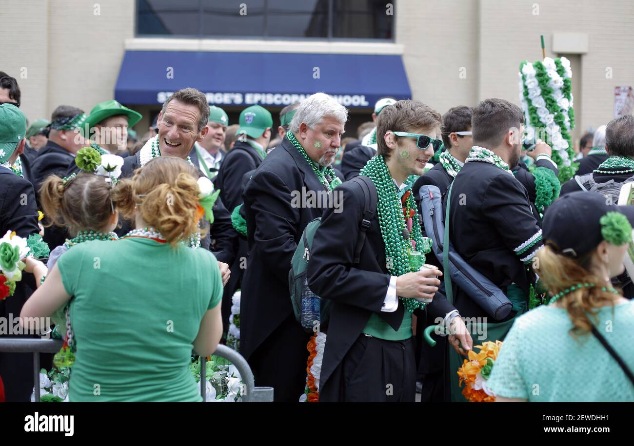 The Irish Channel St Patrick's Day parade makes its way along Magazine