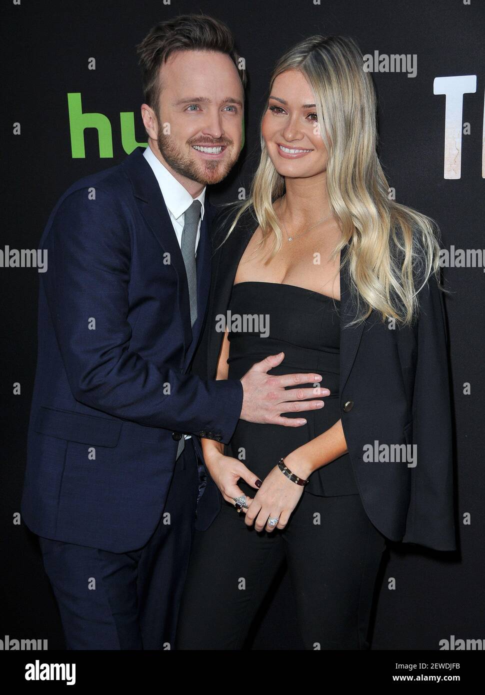 (L-R) Aaron Paul and Lauren Parsekian arrives at Hulu’s “The Path” Los