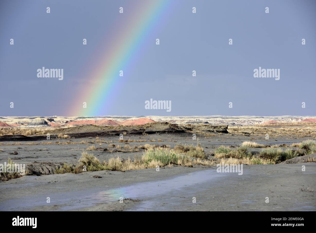 A rainbow pictured over the Bisti/De-Na-Zin Wilderness in New Mexico on April 8, 2016. The area was once a delta that lay to the west of the Western Interior Seaway 70 million years ago, and the badlands  were formed by the erosion of the sandy Ojo Alamo Formation. (Photo by Alex Milan Tracy) *** Please Use Credit from Credit Field *** Stock Photo