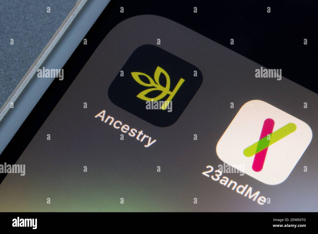 Ancestry and 23andMe mobile apps are seen on an iPhone on March 1, 2021. Both companies provide personal genetic DNA tests including health... Stock Photo
