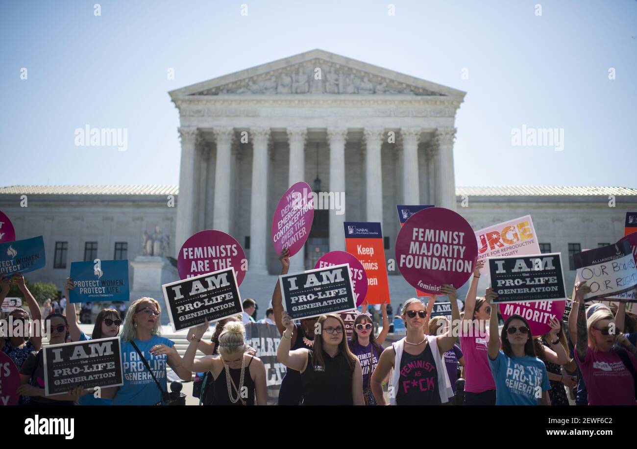 Pro-choice and pro-life demonstrators rally outside of the U.S. Supreme Court on Monday morning, June 20, 2016. The court is expected to hand down their decision on a Texas law which requires clinics to meet the same standards as ambulatory surgical centers and forces doctors to have admitting privileges at nearby hospitals. (Photo By Bill Clark/CQ Roll Call)  *** Please Use Credit from Credit Field *** Stock Photo