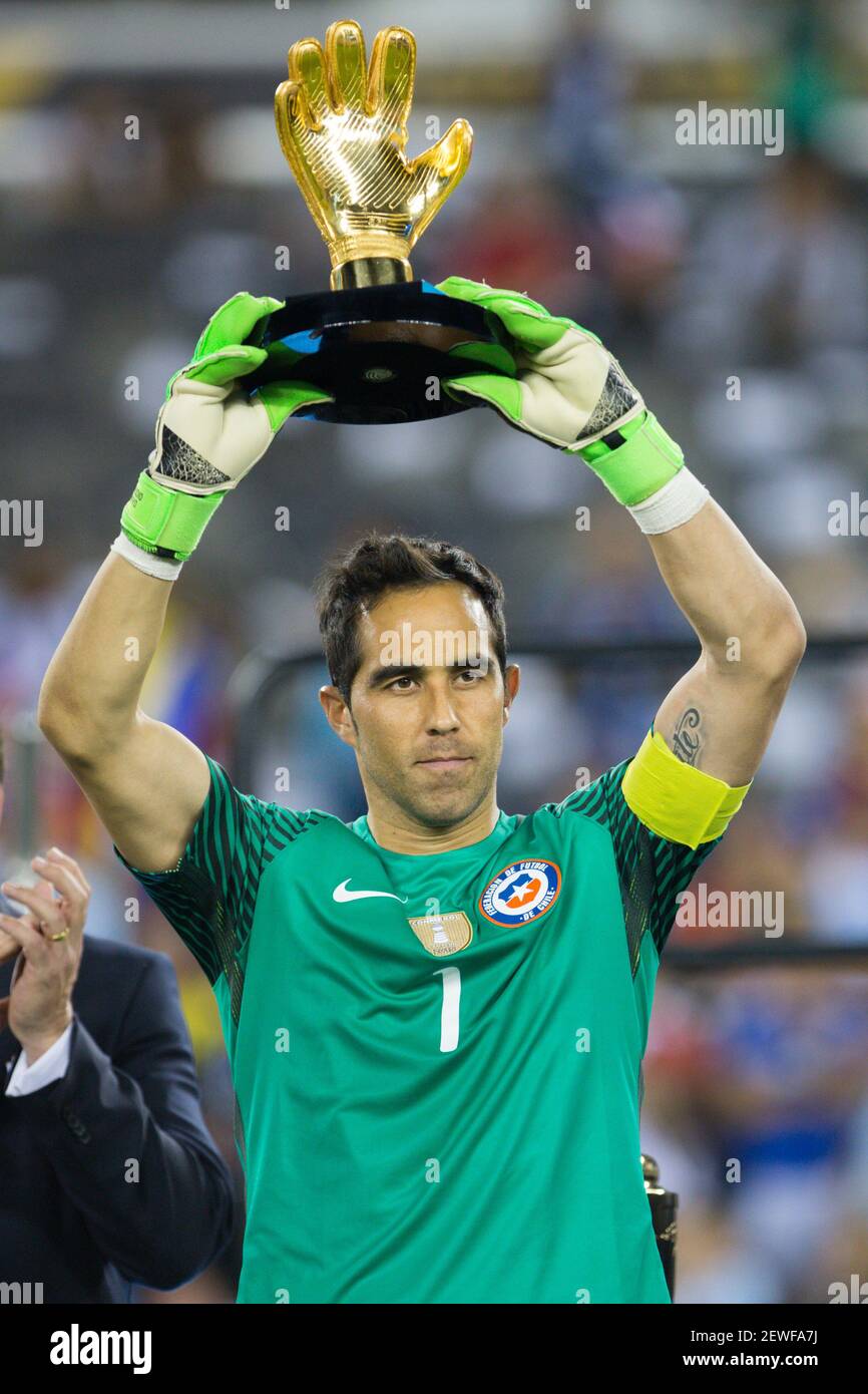 Claudio Bravo, goalie of Chile holds the Golden Glove award after winning  the final of 2016 Copa America Centenario soccer tournament at the Metlife  Stadium in New Jersey, the United States on