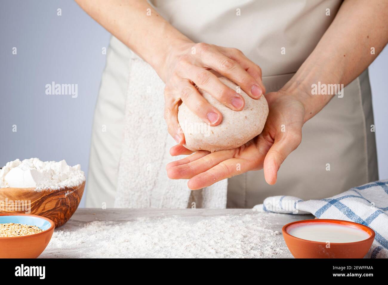 Bread making dough in a bowl Stock Photo - Alamy