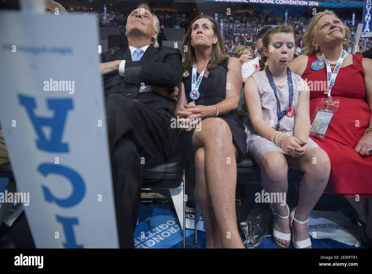 UNITED STATES - JULY 26: From left, Virginia Gov. Terry McAuliffe, his wife Dorothy, and Fiona Rodham, 9, niece of Hillary Clinton, appear on the floor of the Wells Fargo Center in Philadelphia, Pa., on the second day of the Democratic National Convention, July 26, 2016.  Stock Photo