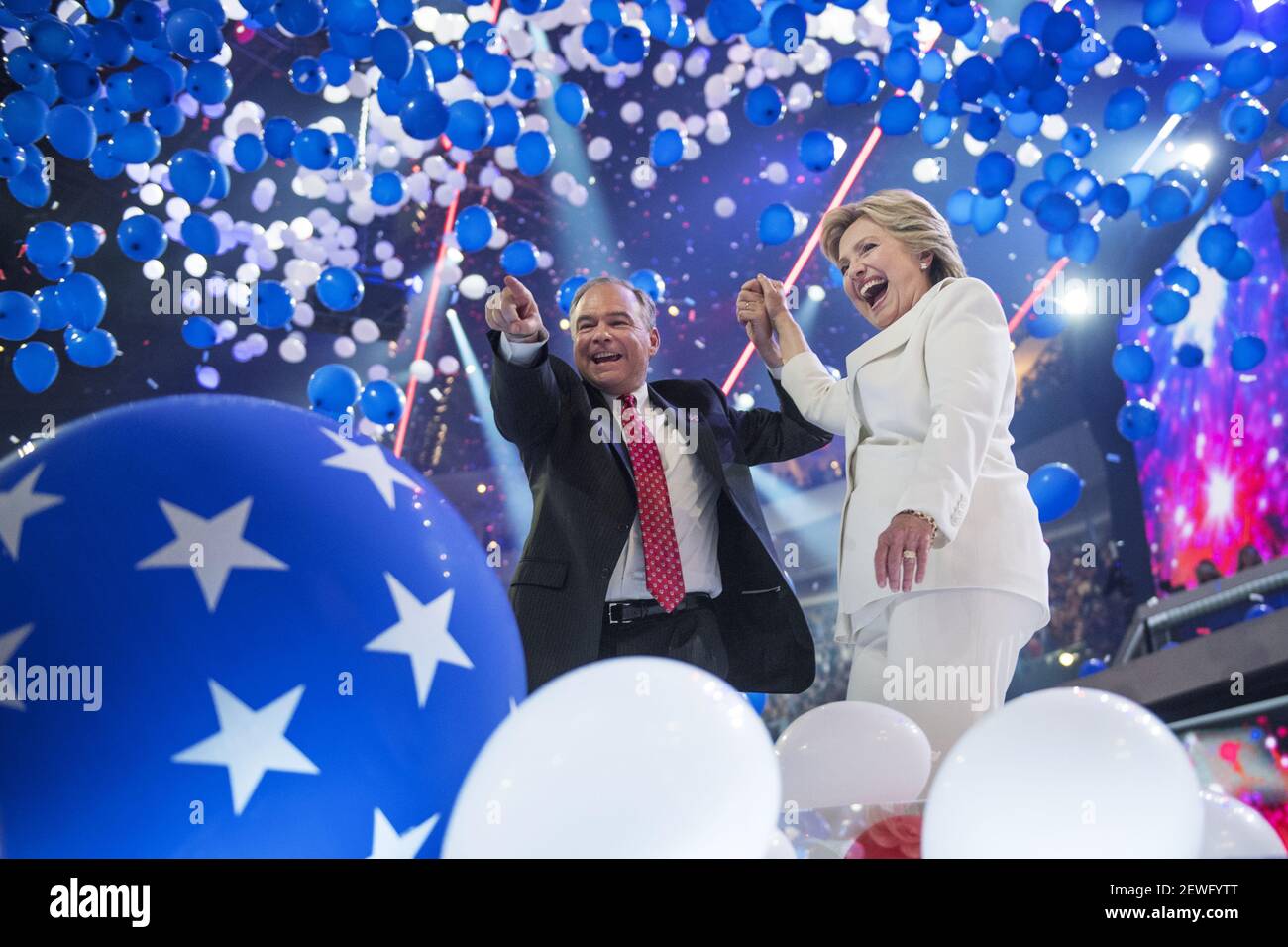 UNITED STATES - JULY 28: Democratic Presidential nominee Hillary Clinton and her running mate Sen. Tim Kaine, D-Va., celebrate on the stage of the Wells Fargo Center in Philadelphia, Pa., on the final night of the Democratic National Convention, July 28, 2016. (Photo By Tom Williams/CQ Roll Call) *** Please Use Credit from Credit Field *** Stock Photo