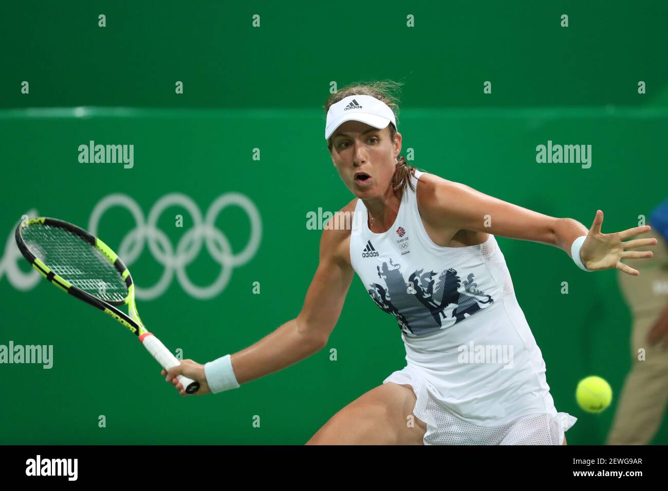 Aug 7, 2016; Rio de Janeiro, Brazil; Johanna Konta (GBR) hits a forehand to Stephanie  Vogt (LIE, not pictured) during the women's singles in the Rio 2016 Summer  Olympic Games at Olympic