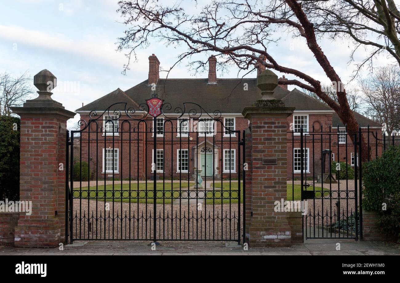 YORK, YORKSHIRE, UK - MARCH 14, 2010:  Exterior view of The Deanery, close to York Minster behind iron gates Stock Photo