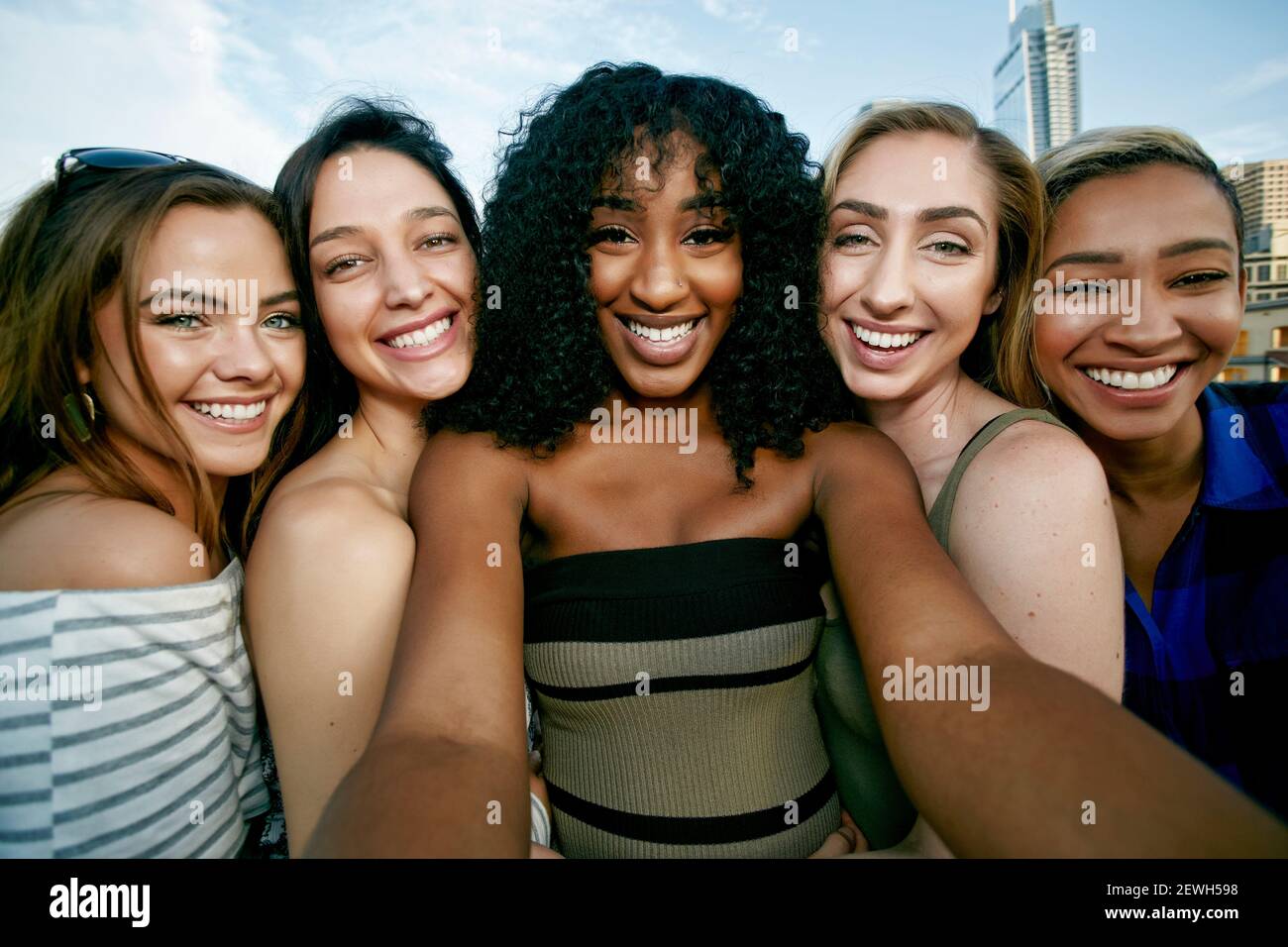 A group of five young women posing for a selfie Stock Photo