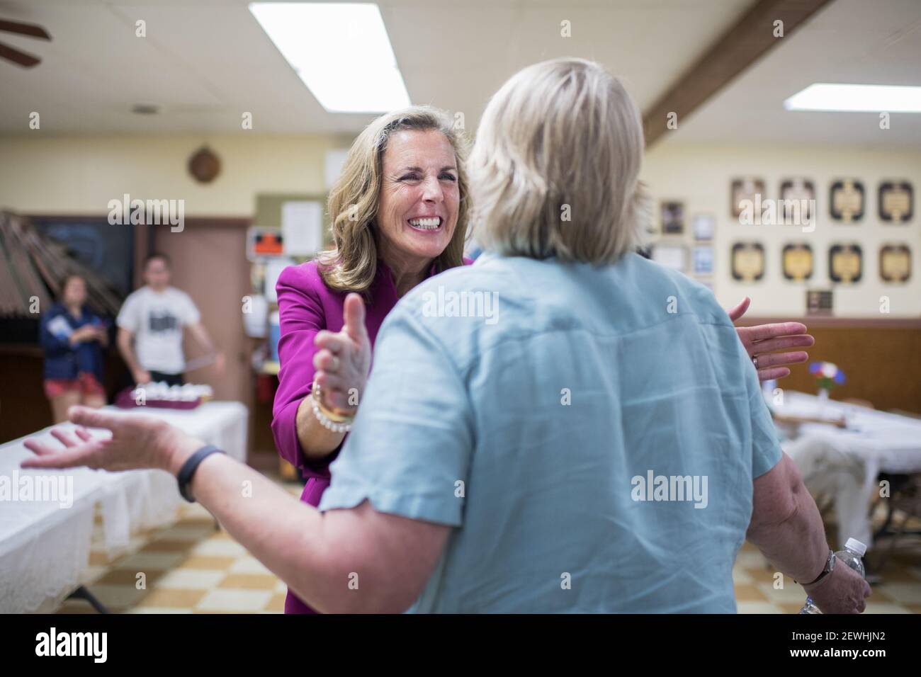 UNITED STATES - AUGUST 17: Katie McGinty, Democratic candidate for Pennsylvania Senate, talks with a guest during the Annual Penn Ag Democrat Barbeque at the Ferguson Township Lions Club in Pine Grove Mills, Pa. August 17, 2016. (Photo By Tom Williams/CQ Roll Call) *** Please Use Credit from Credit Field *** Stock Photo