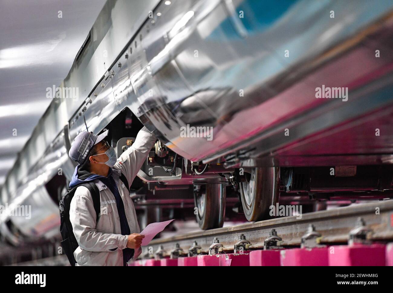 Guangzhou, China's Guangdong Province. 3rd Mar, 2021. A technician