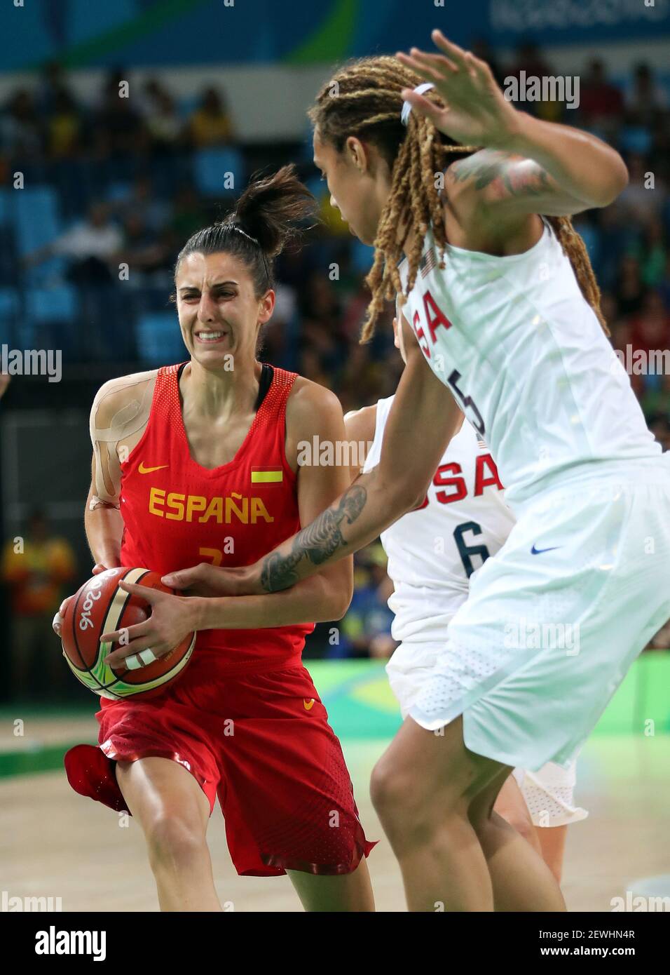 Rio de Janeiro, Brazil; Spain guard Alba Torrens (7) drives to the basket  against USA center Brittney Griner (15) in the women's basketball gold  medal match during the Rio 2016 Summer Olympic